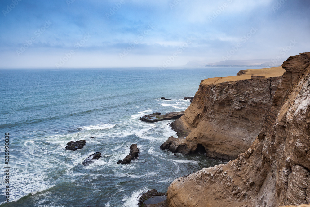 The stunning and impressive cliffs of Paracas National Reserve where the desert meets the ocean. 