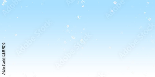 Sparse snowfall Christmas background. Subtle flyin