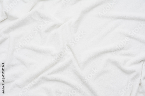 white crumpled blanket, plaid, top view