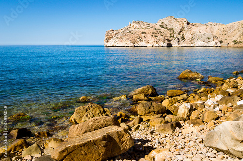 Beautiful background of a Moroccan  beach with waves and sea in summer in Al hoceima photo