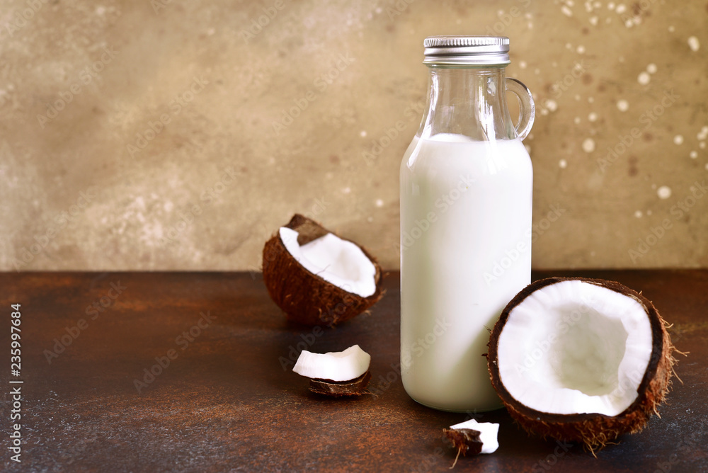 Coconut vegan milk in a bottle. Coconut vegan milk in a bottle.