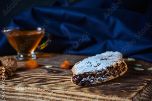 Roll cookies with nuts on a wooden table. Georgian dessert.