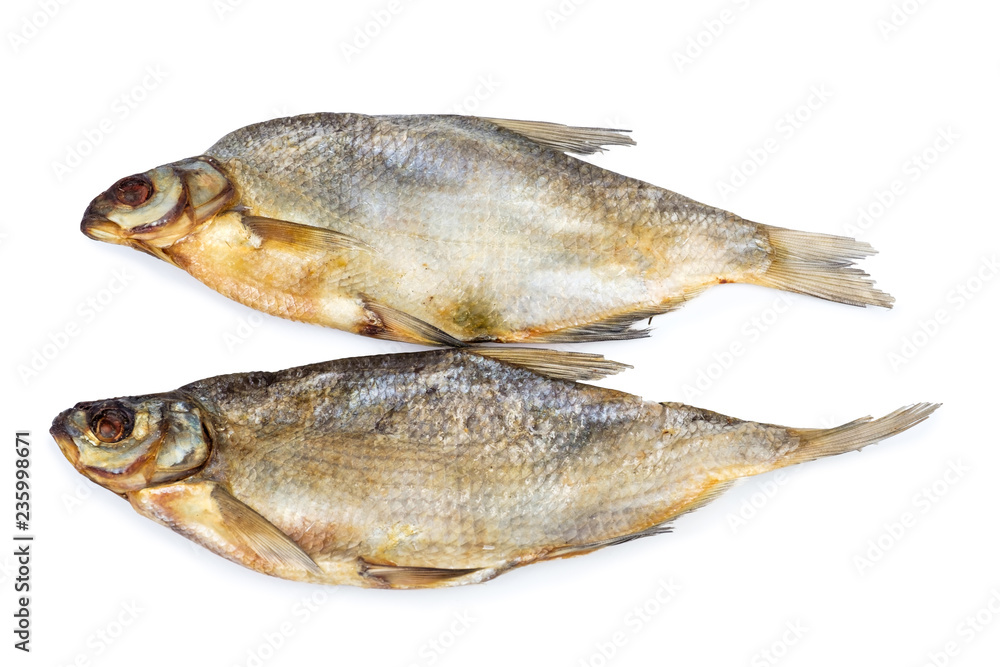 Dried salted fishes isolated on white backdrop. Dried salted fishes isolated on white backdrop.