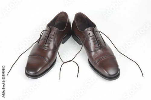 Classic men's brown shoes on white background