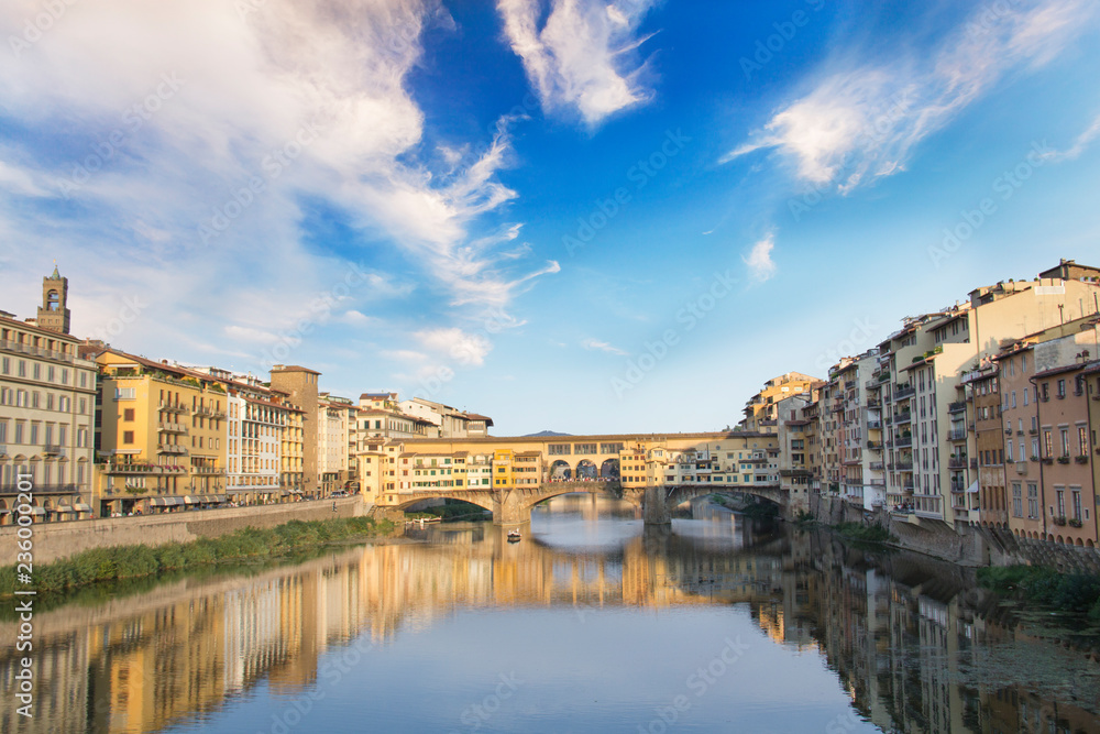 Beautiful view of the Ponte Vecchio bridge across the Arno River in Florence, Italy