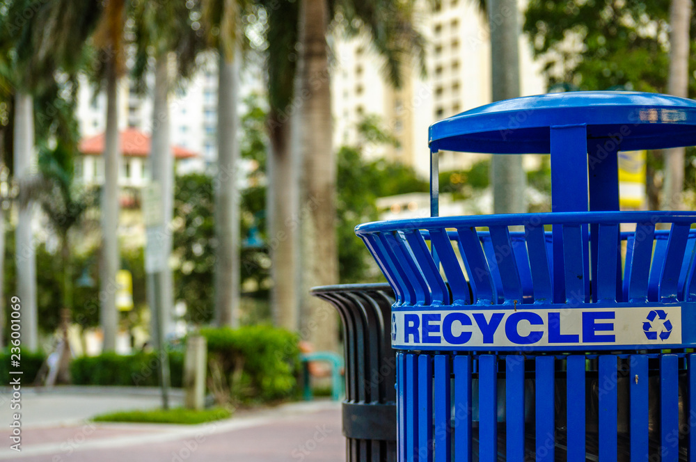 Blue Recycle Bin in the City