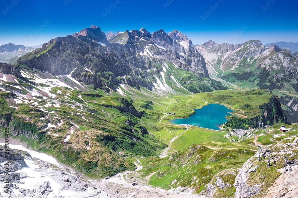 View of Truebsee and Swiss Alps from Titlis mountain. - obrazy, fototapety, plakaty 