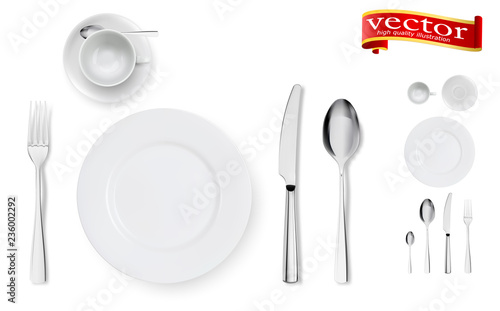 Set of fork, knife, cup, plate and spoons isolated on white