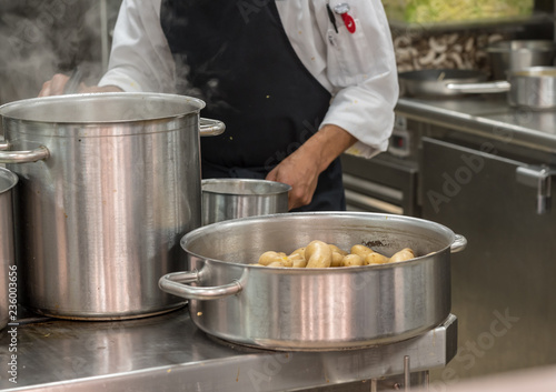 Fotografie Modern stainless steel hobs in commercial kitchen