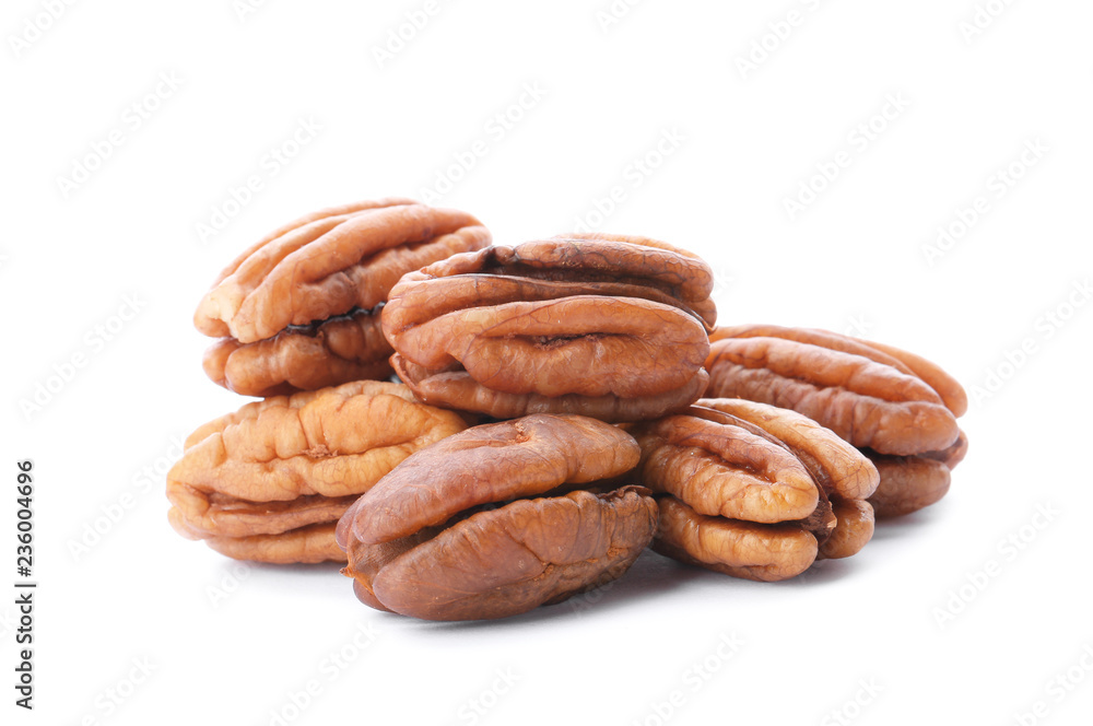 Heap of ripe shelled pecan nuts on white background Heap of ripe shelled pecan nuts on white background