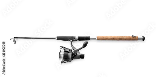 Modern fishing rod with reel on white background, top view