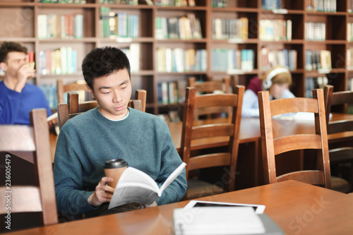 Asian student with book stu...
