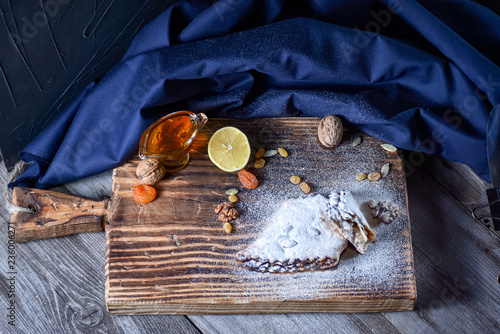 Oriental recipe. Dessert with dried fruits, lemon and honey photo