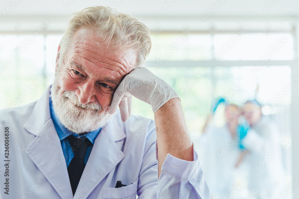 Portrait Science men working with chemicals in lab Portrait Science men working with chemicals in lab