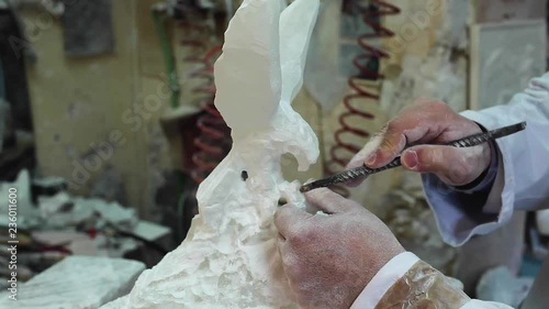 Artist Sculpting Alabaster Statue