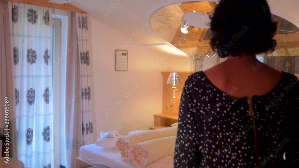 Hispanic woman calling the room service of the hotel form a luxury suite. 4k Hispanic woman calling the room service of the hotel form a luxury suite. 4k