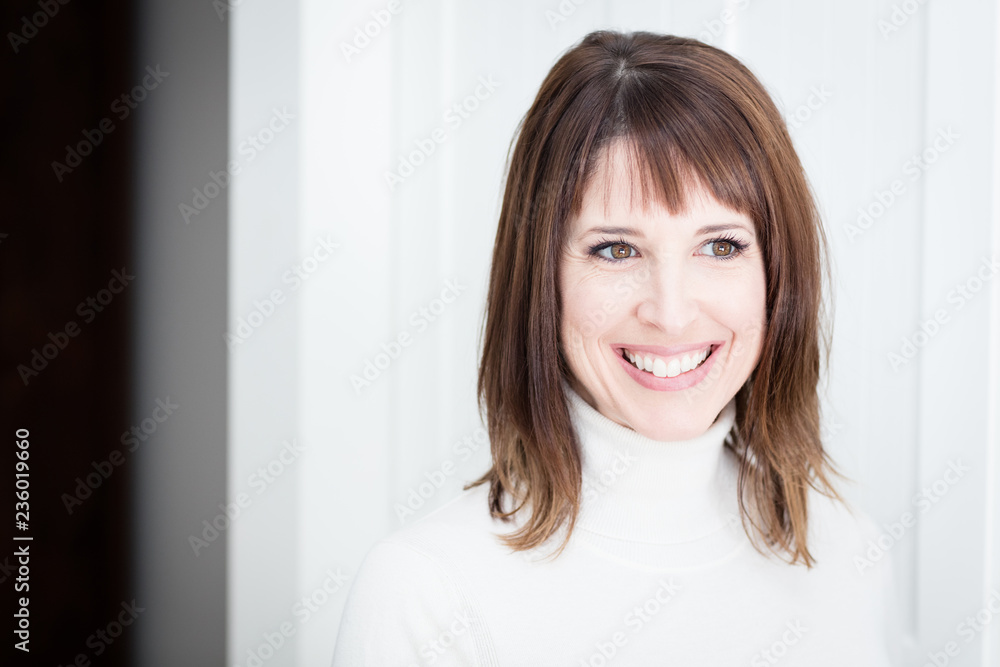 Portrait Of A Pretty Woman Smiling, Looking Away, Isolated On White Portrait Of A Pretty Woman Smiling, Looking Away, Isolated On White