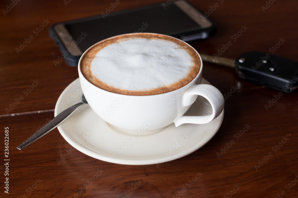 Hot coffee in ceramic glass on wood table
Hot coffee in ceramic glass on wood table