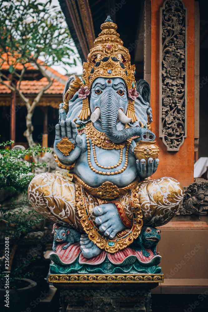 Ganesha portrait - Hindu Buddhist deities, traditional sculpture. Bali, Indonesia