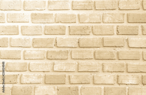 Wall stained old grungy stucco texture background. Brickwork flooring interior rock old pattern clean concrete have grid uneven design stack. Abstract kitchen wallpaper modern cream brick tile.