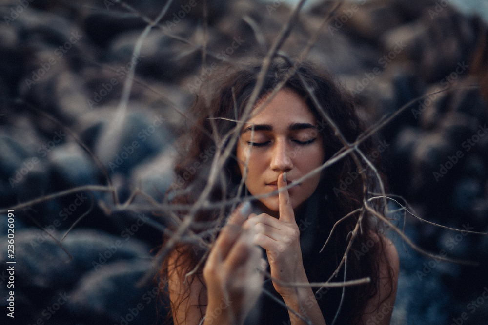 Obraz premium close up of beautiful young woman outdoors. witch craft concept