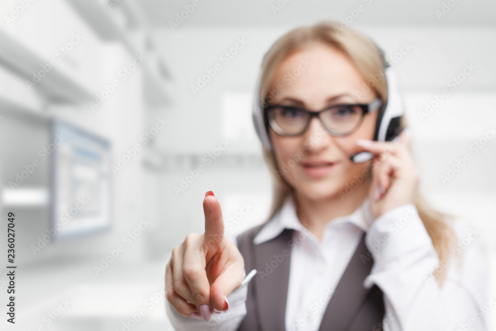 Three call center service operators at work. Portrait of smiling pretty female helpdesk employee with headset at workplace.