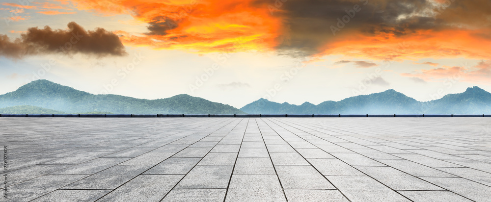 Empty floor and mountain with beautiful clouds at sunset - obrazy, fototapety, plakaty 