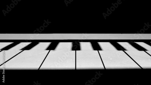 Piano keys created with Shadow and Light on the ground