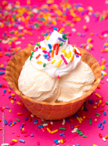 Vanilla Ice Cream in a Waffle Cone Bowl on a Pink Background