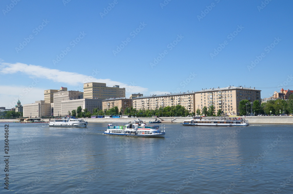 Moscow, Russia - June 15, 2018: Summer view of Frunzenskaya embankment and passing ships