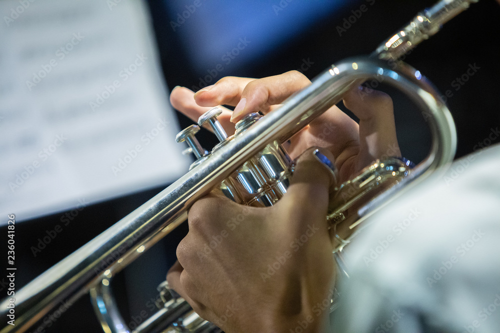 Obraz premium Young musician playing music on band instrument at a school band