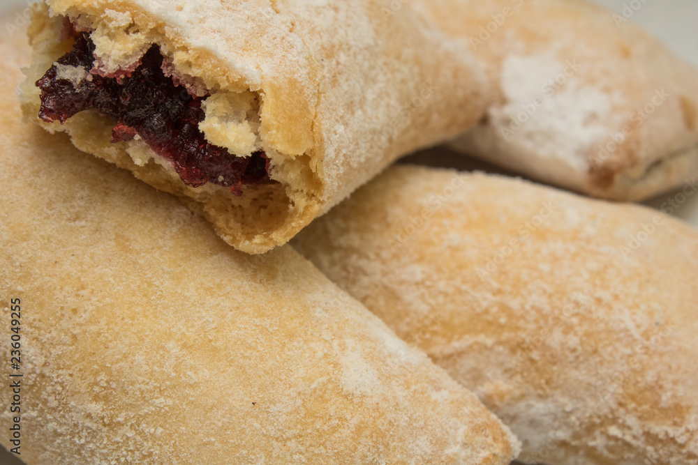 fresh healthy patties with jam and powdered sugar fresh healthy patties with jam and powdered sugar