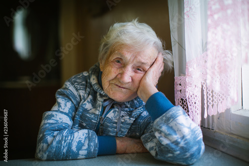 Portrait of russian elderly woman close-up. Age 90 years old.