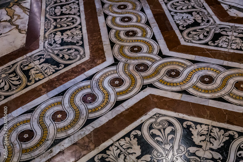 ancient marble carvings on the floor of Siena cathedral
