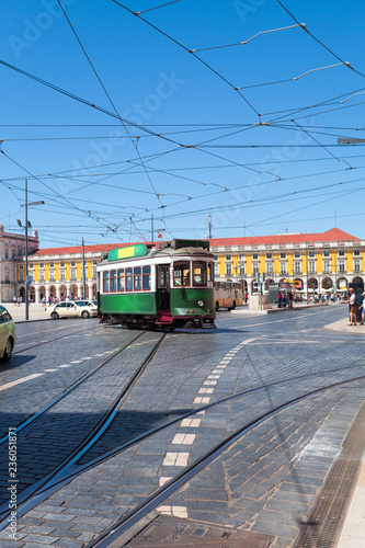 Commerce Square with a beautiful green tram, Lisbon, Portugal