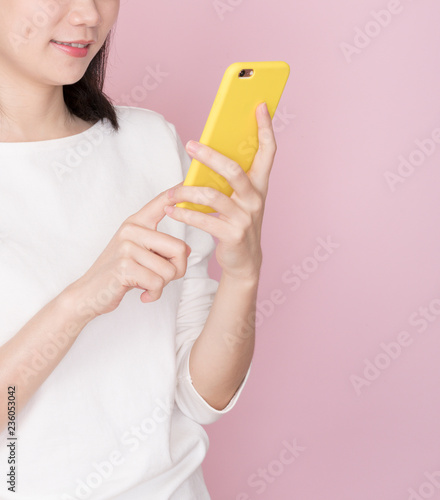 Asian female on pink background