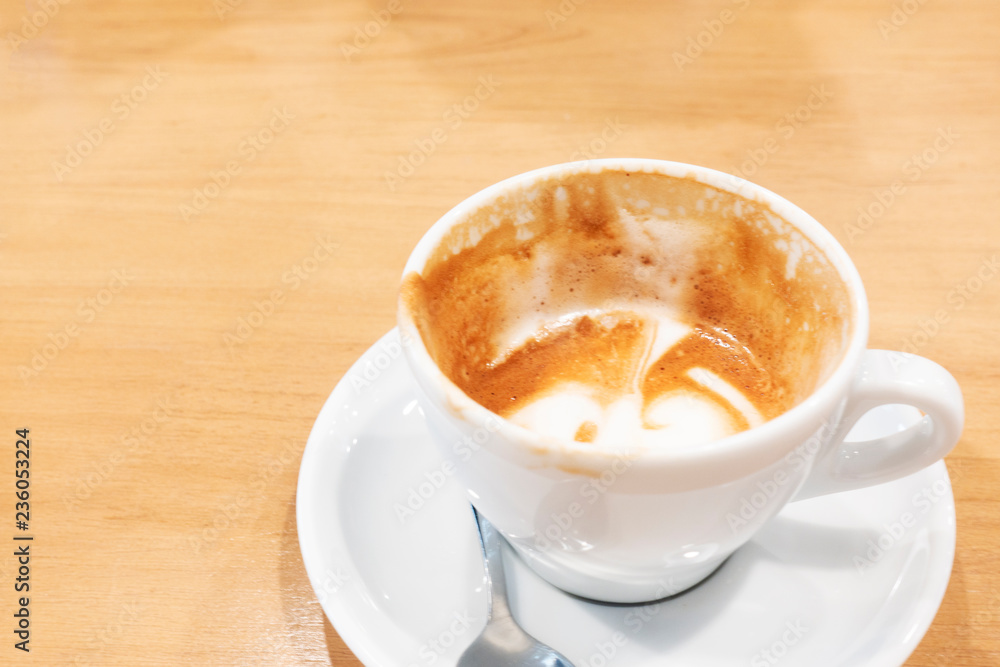 Hot coffee latte on a wooden table. Hot coffee latte on a wooden table.