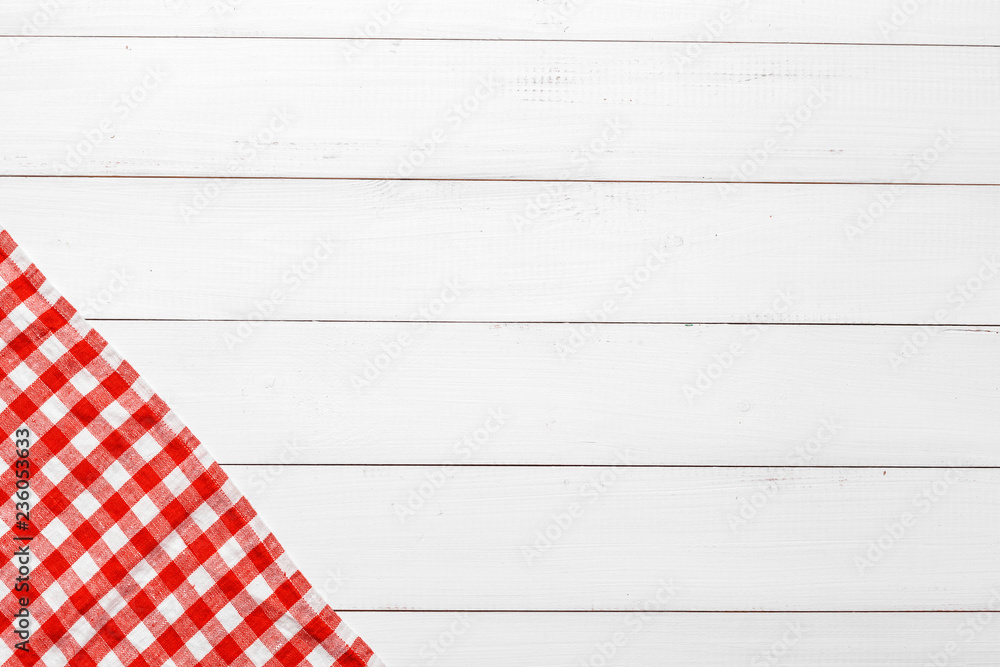 checkered tablecloth on wooden table checkered tablecloth on wooden table