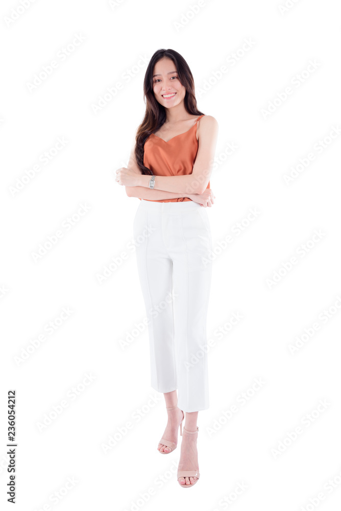 Full length of beautiful young asian woman smiling at camera isolated over white background Full length of beautiful young asian woman smiling at camera isolated over white background