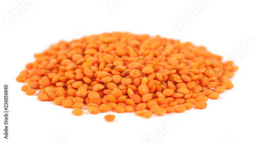 pile red lentils isolated on white background