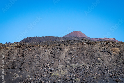 Edge of lava field and looking towards Teneguia Volcano, La Palma Island, The Canaries. Teneguia volcano last erupted in 1971