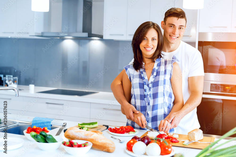 Couple cooking together at home