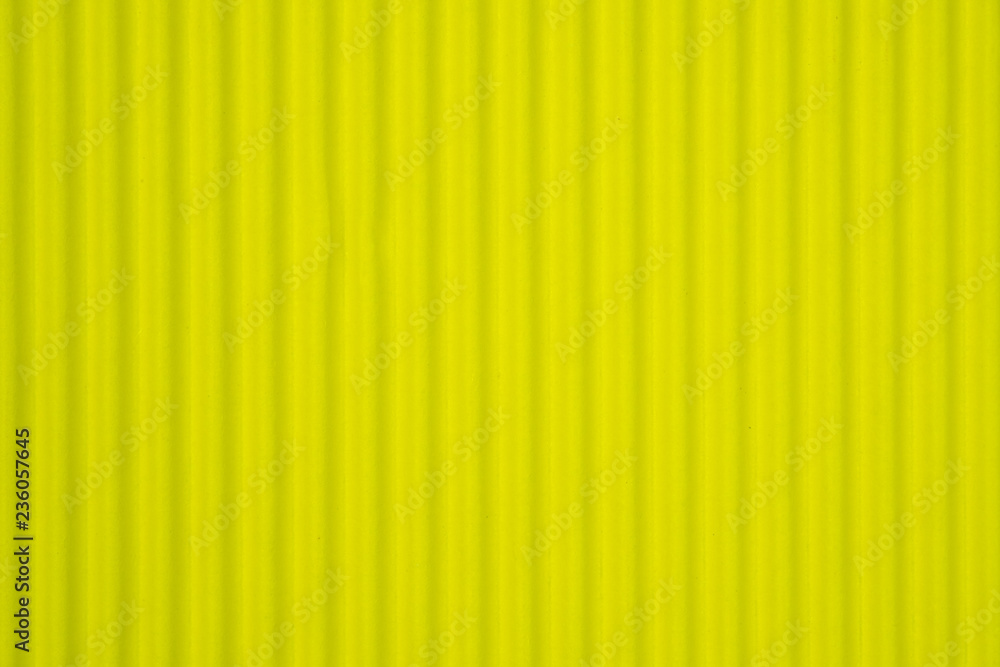Yellow corrugated paper texture, use for background. vivid colour with empty space for add text or object. Yellow corrugated paper texture, use for background. vivid colour with empty space for add text or object.