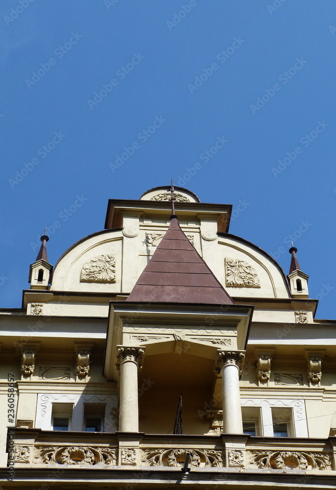 Pediment of a building typical of Prague, Czech Republic