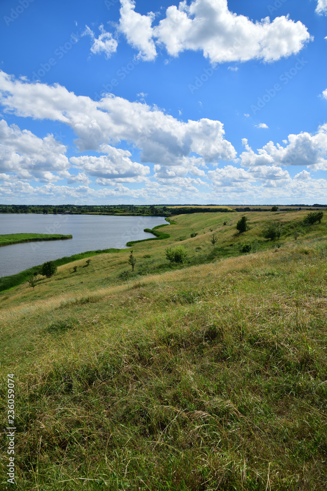 Beautiful summer countryside landscape with a lake Beautiful summer countryside landscape with a lake