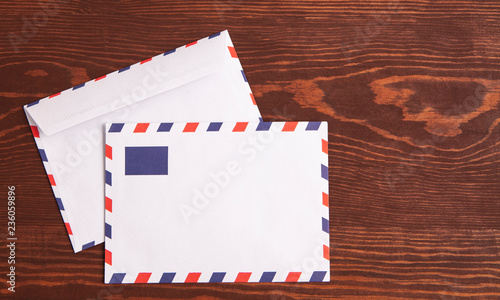 envelopes on wooden background