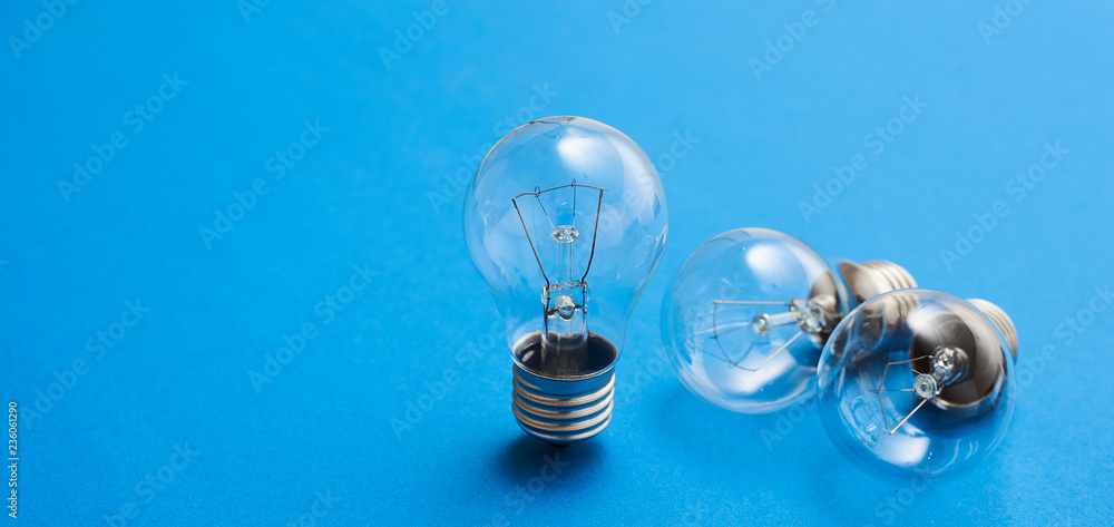 Idea concept with light bulbs on a blue background Idea concept with light bulbs on a blue background