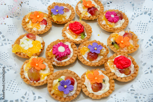 Catering sweets, closeup of various kinds of cakes on event or wedding reception - selective focus