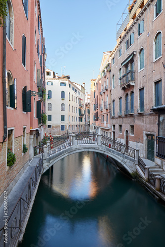 Venice, ancient buildings and calm water in the canal, nobody in the morning in Italy © andersphoto
