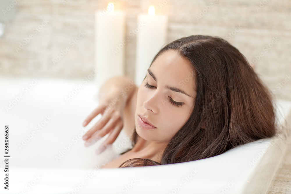 Fototapeta premium Woman takes bathroom